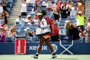 NEW YORK, NY - SEPTEMBER 11: Serena Williams of the United States takes the court for her Women's Singles Semifinals match against Roberta Vinci of Italy on Day Twelve of the 2015 US Open at the USTA Billie Jean King National Tennis Center on September 11, 2015 in the Flushing neighborhood of the Queens borough of New York City.   Matthew Stockman/Getty Images/AFP