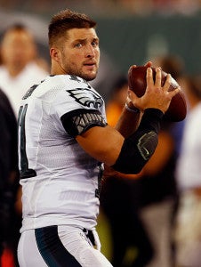 EAST RUTHERFORD, NJ - SEPTEMBER 03: Quarterback Tim Tebow #11 of the Philadelphia Eagles warms up on the sidelines against the New York Jets in the third quarter during a pre-season game at MetLife Stadium on September 3, 2015 in East Rutherford, New Jersey. (Photo by Rich Schultz /Getty Images)
